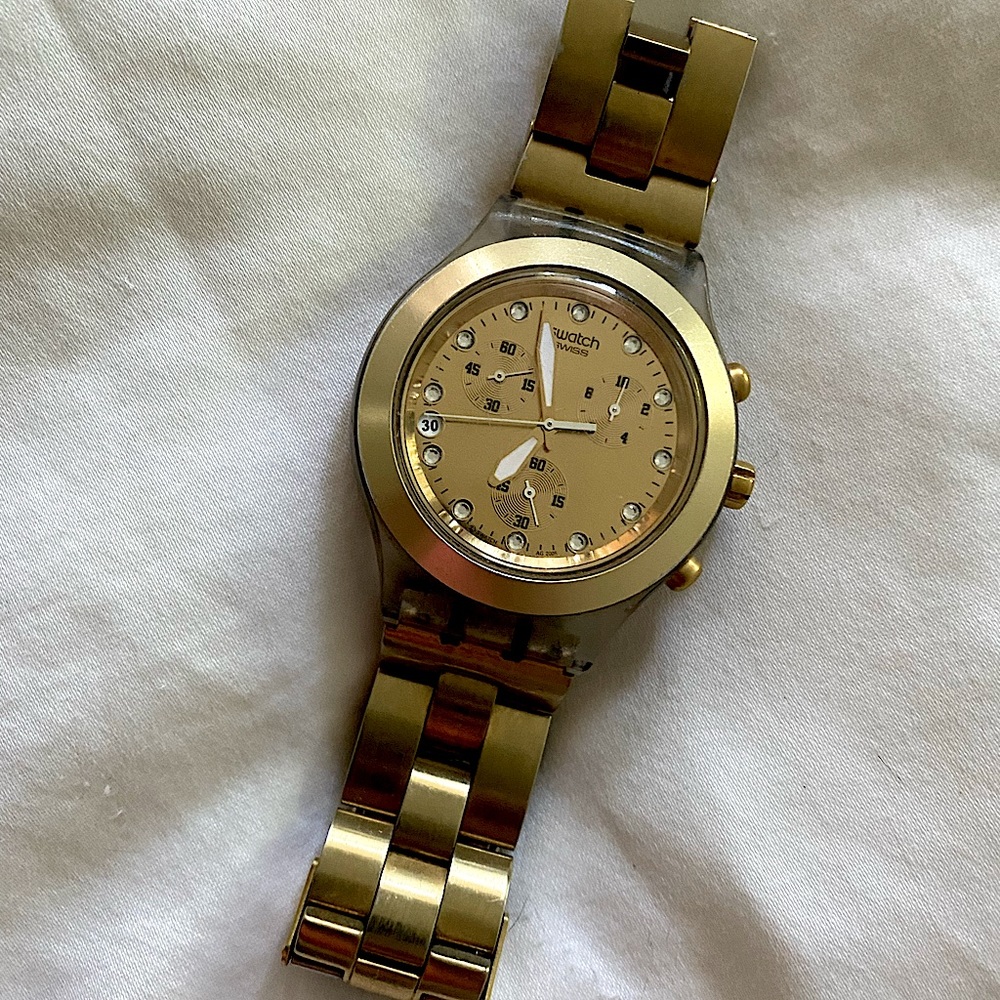 Swatch watch in gold